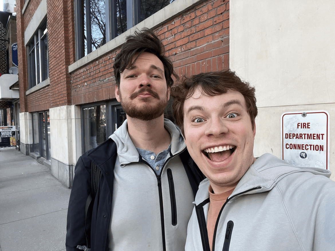 Selfie of two guys in the same hoodie