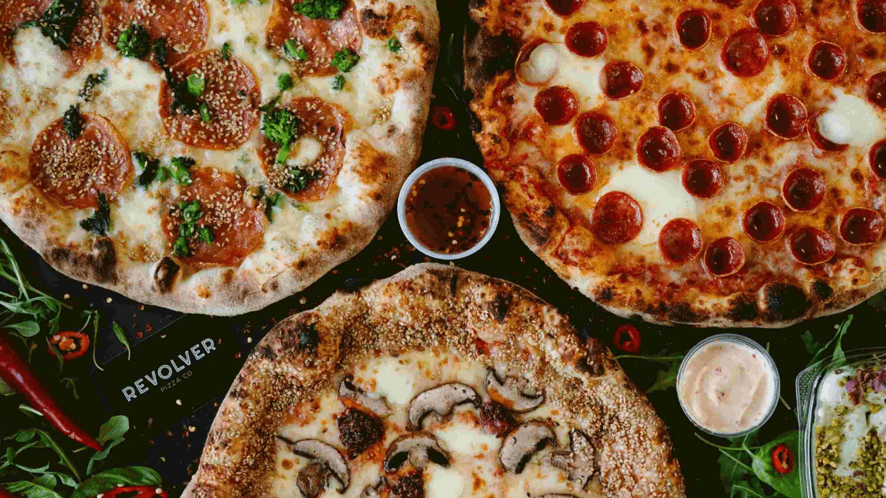 A promotional image for Revolver Pizza
