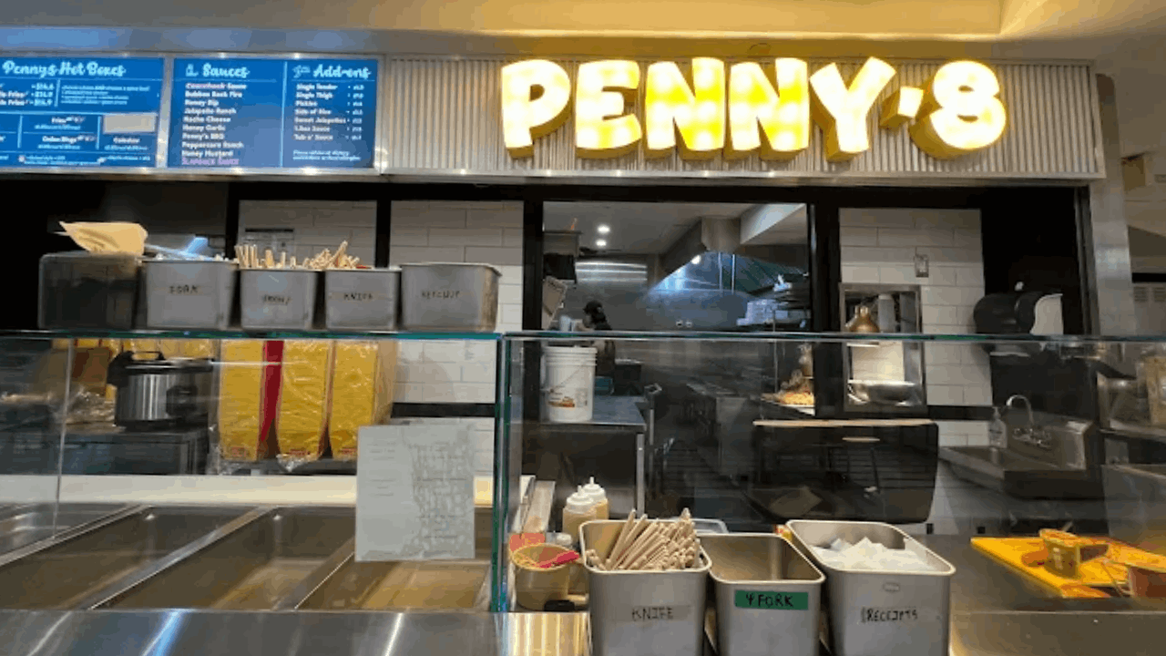 A food court Penny's Hot Chicken