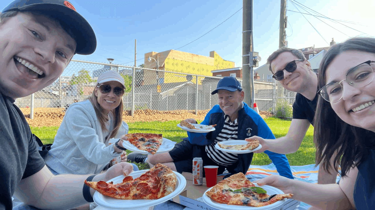 Family having pizza from Pizzeria Badiali