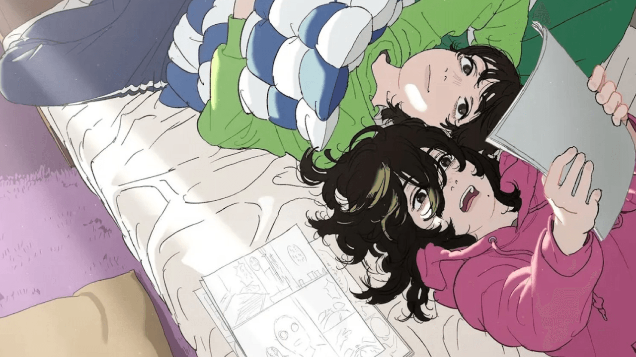 The two main characters of Look Back looking at their manga together